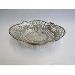 A continental silver pierced basket embossed design, stamped 800, 26cm long x 7cm tall,