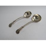 A pair of silver ladles, London 1837 with scallop detail, mongram to reverse of handle,