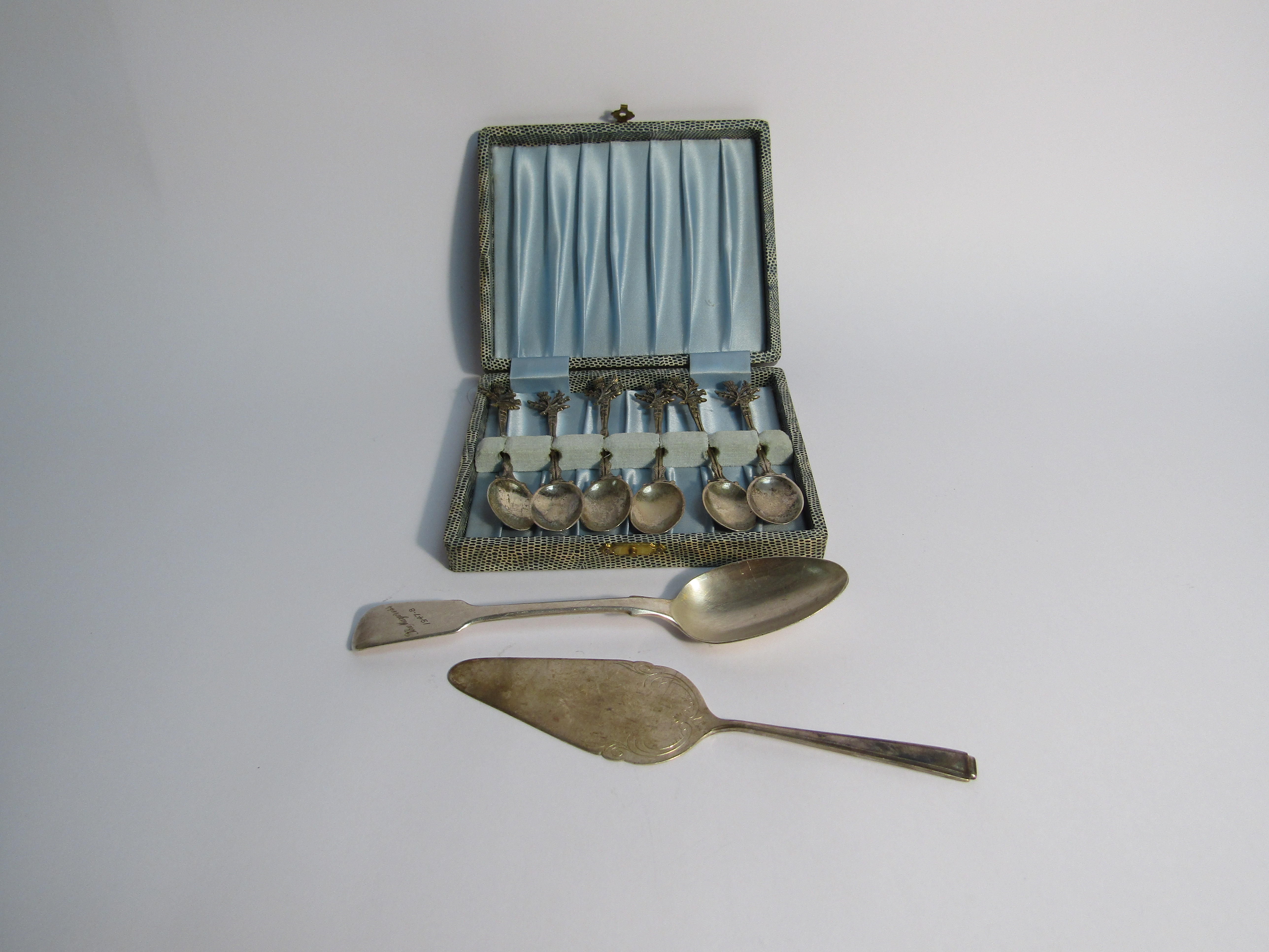 A set of six Edinburgh silver teaspoons with thistle finials,