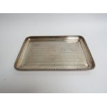 A Levi & Salaman silver tray with vacant central cartouche, engine turned detail, bobbin border,