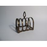 An Emile Viner silver five bar toast rack, misshapen,