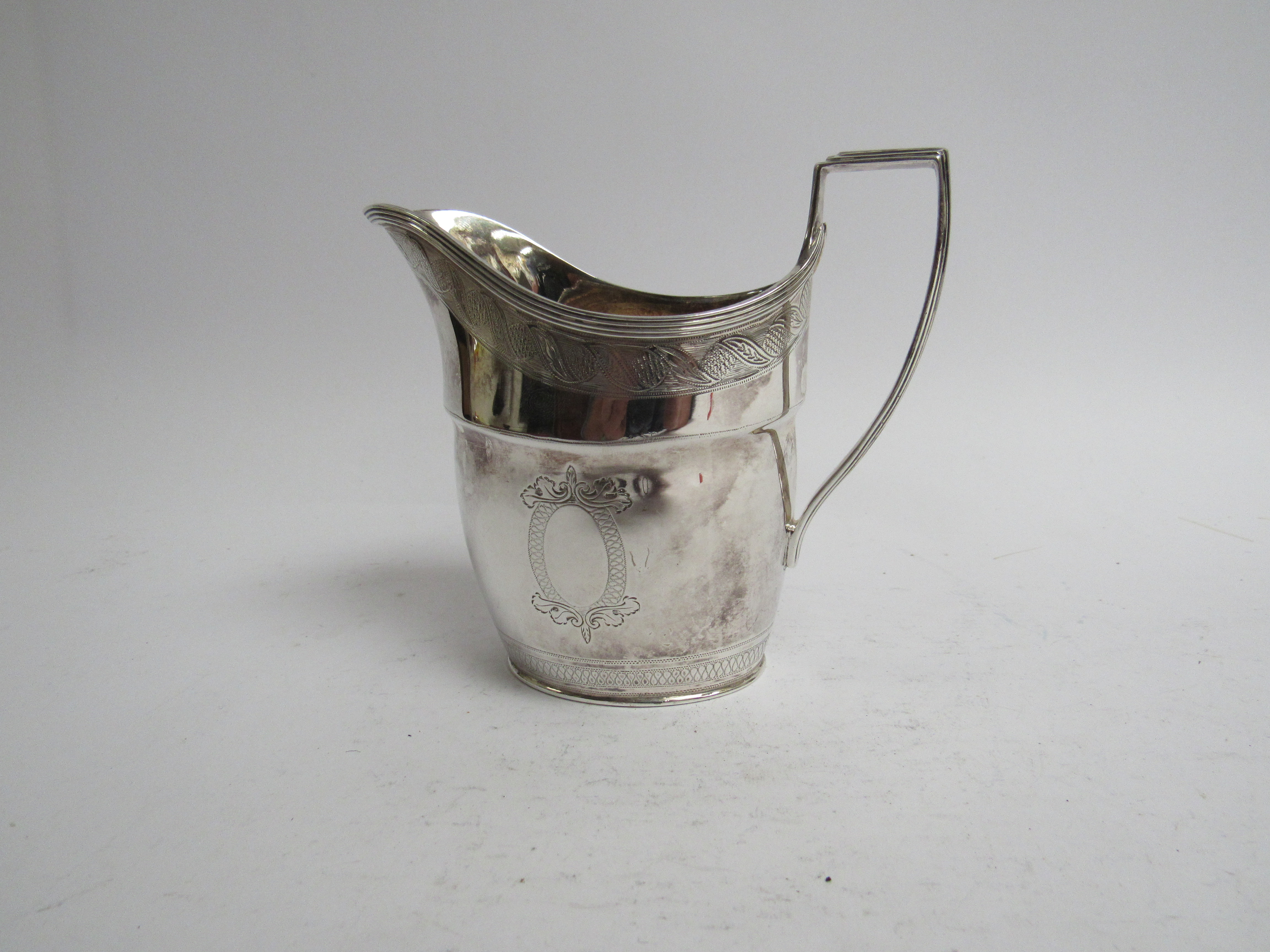 A Henry Stratford Georgian style silver milk jug Sheffield 1895 retailed by Pearce & Sons Leeds, - Image 3 of 3