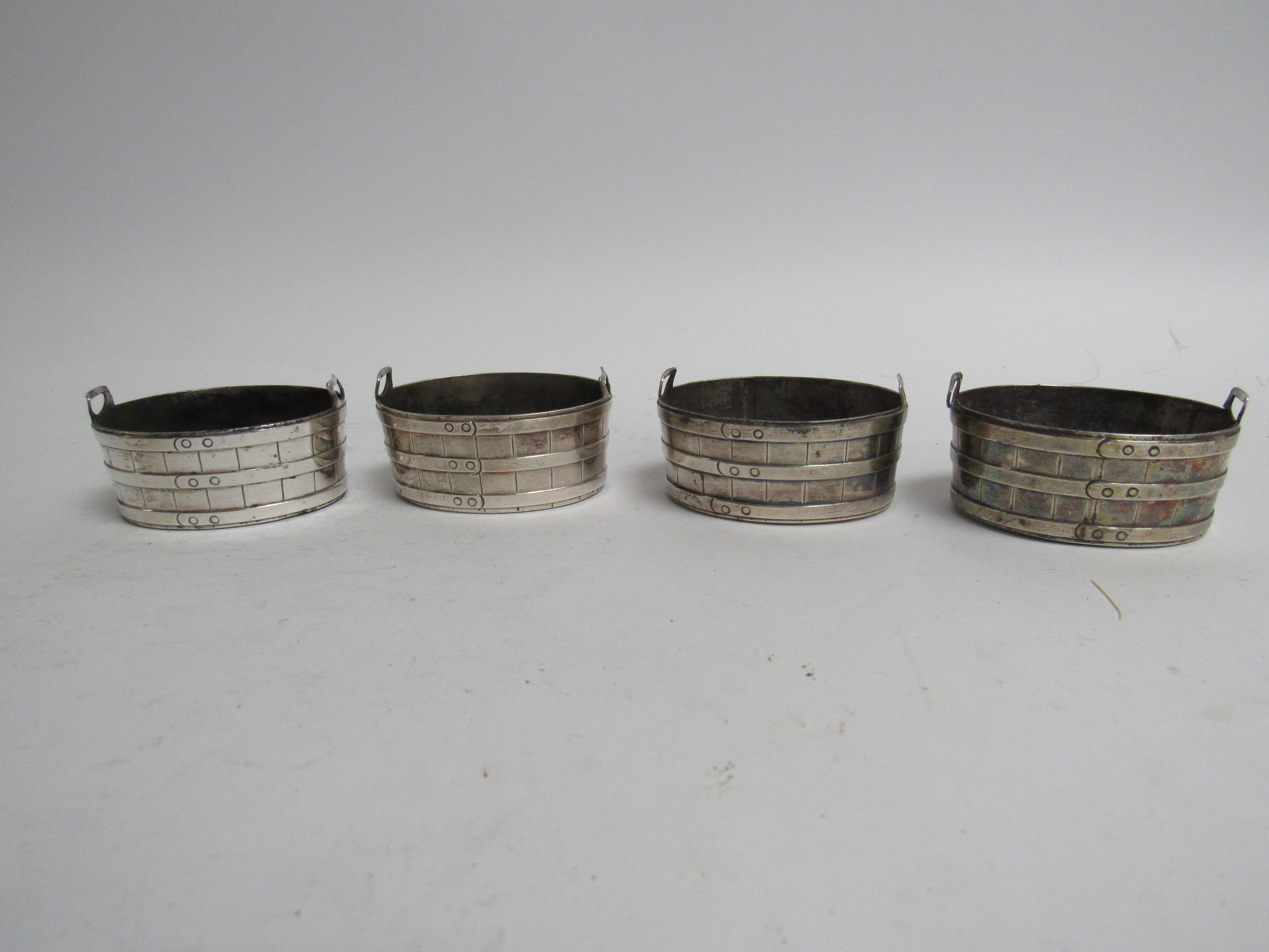 A set of four Thomas Tongue Victorian silver wash bucket barrel form salts, Birmingham 1868,