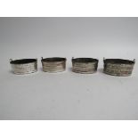 A set of four Thomas Tongue Victorian silver wash bucket barrel form salts, Birmingham 1868,