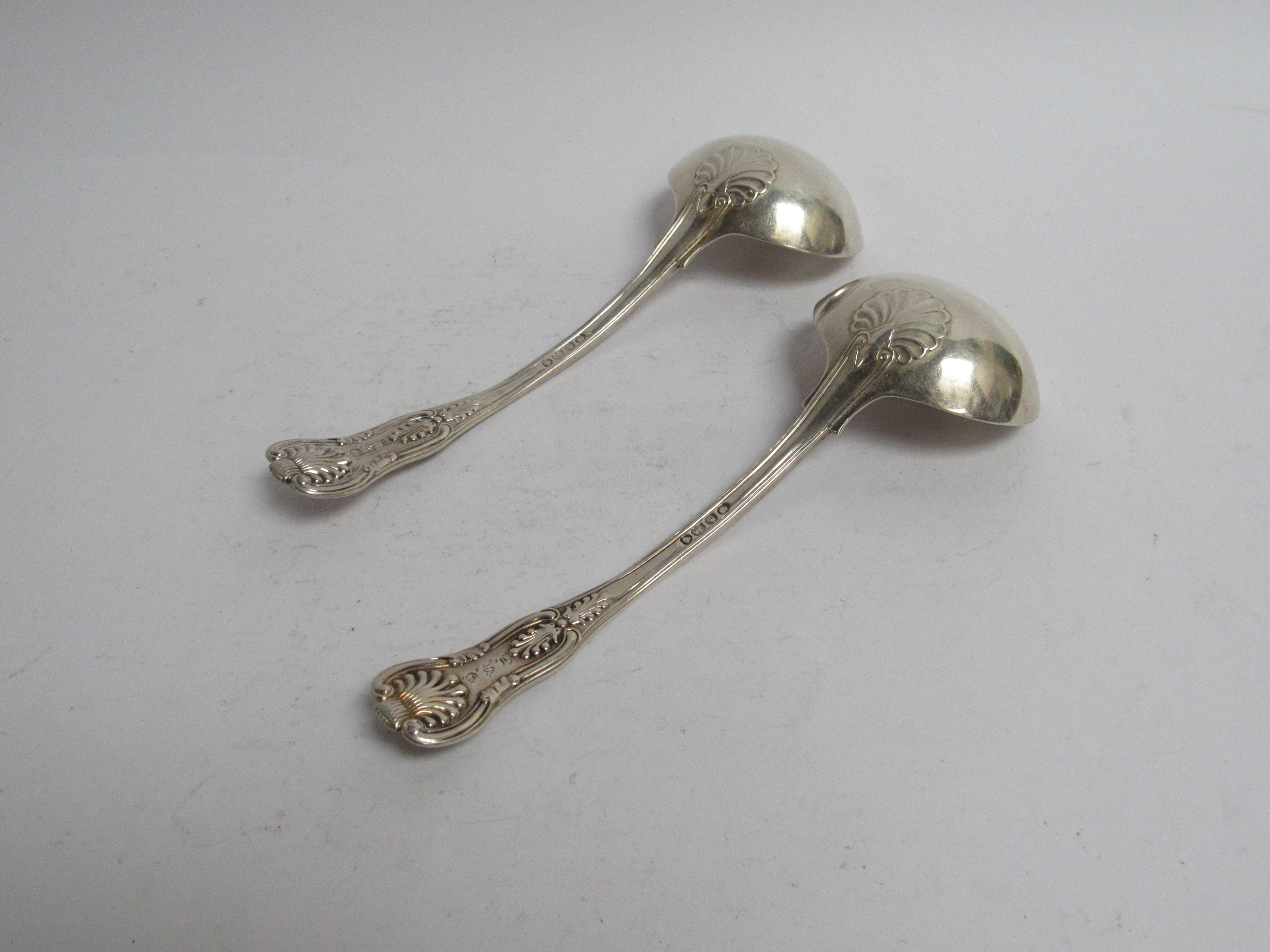 A pair of silver ladles, London 1837 with scallop detail, mongram to reverse of handle, - Image 2 of 3