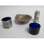 A pierced silver pepperette, salt, scallop form dish and Bristol blue liner,