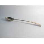 A Georgian silver basting spoon marks, rubbed, crested,
