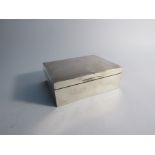 A Walker & Hall silver cigarette box with wood lined interior, Birmingham 1905, 4cm x 11.