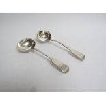 Two Victorian sauce ladles monogrammed and crested handles different makers and dates London 1846 &