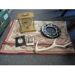 A box containing 1960's Kundo electric clock, antler, picture frame, miniature portraits,