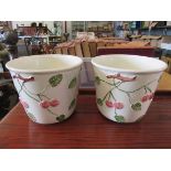 Two glazed planters depicting fruiting trees,