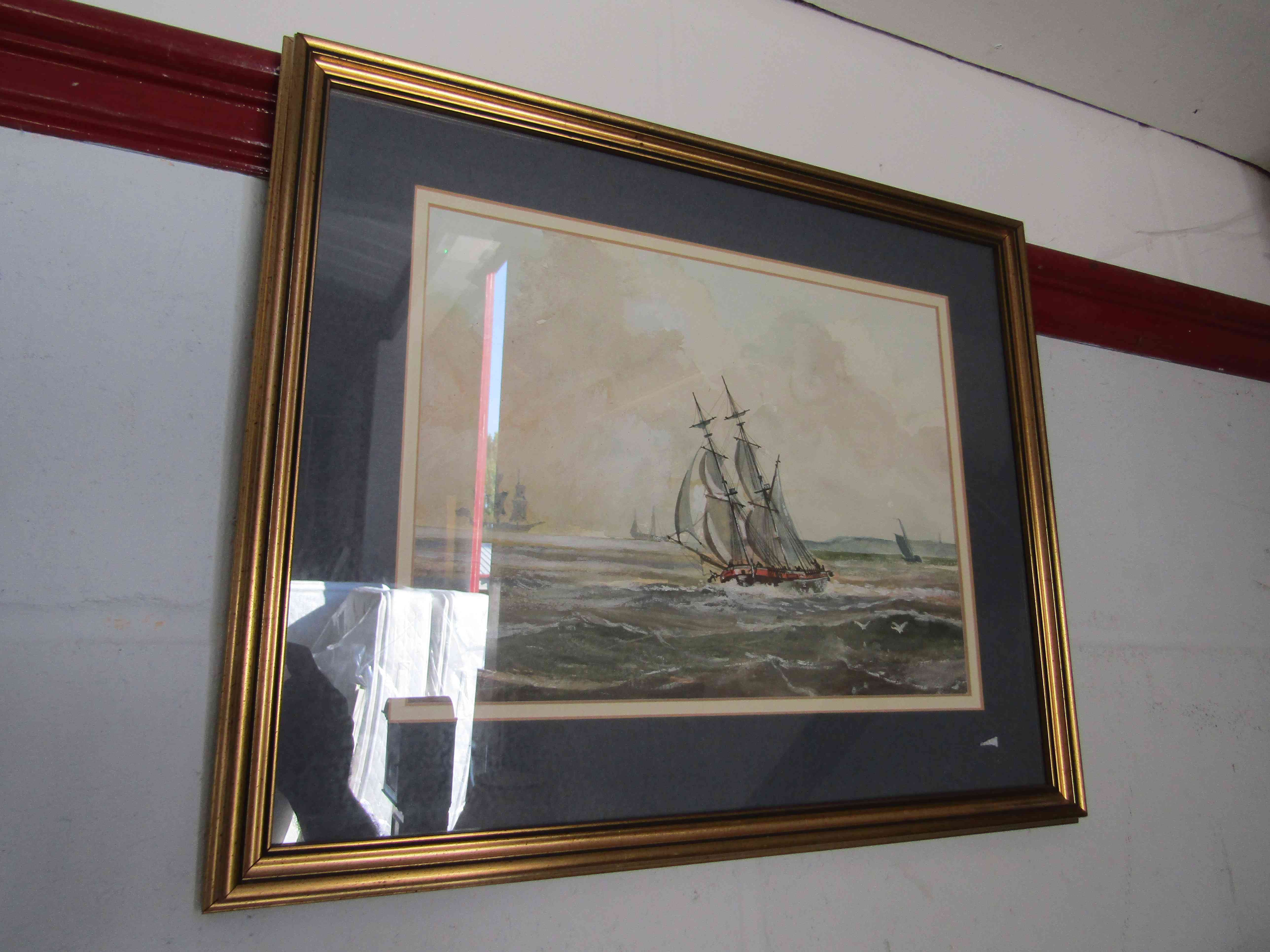 A watercolour of ships at sea, framed and glazed,