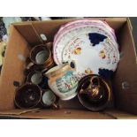 A box of lustre ware jugs and dishes
