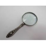 An ornate magnifying glass
