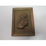 A small bronze plaque of Admiral Nelson,