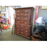 A Georgian chest on chest, two over three drawer top on three drawer base,