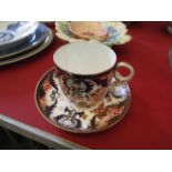 A Derby Imari pattern tea cup and saucer,