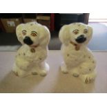 A pair of Royal Doulton white ground spaniels,