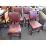 A set of four 1940's oak leatherette studded dining chairs,