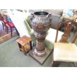 A 19th Century French glazed jardiniere on stand with lion mask details,