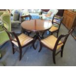 A Regency style circular centre table and a set of four matching chairs,