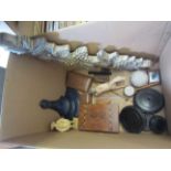 A box of assorted wooden and carved treen including walnut writing box, vase stands,