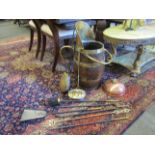 A coopered oak brass mounted coal scuttle, brass chestnut roasters, fire tools,