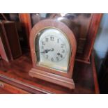 A 1930's oak cased mantel clock,
