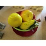 A selection of ceramic fruit in bowl