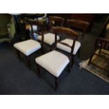 A set of four early Victorian bar-back dining chairs