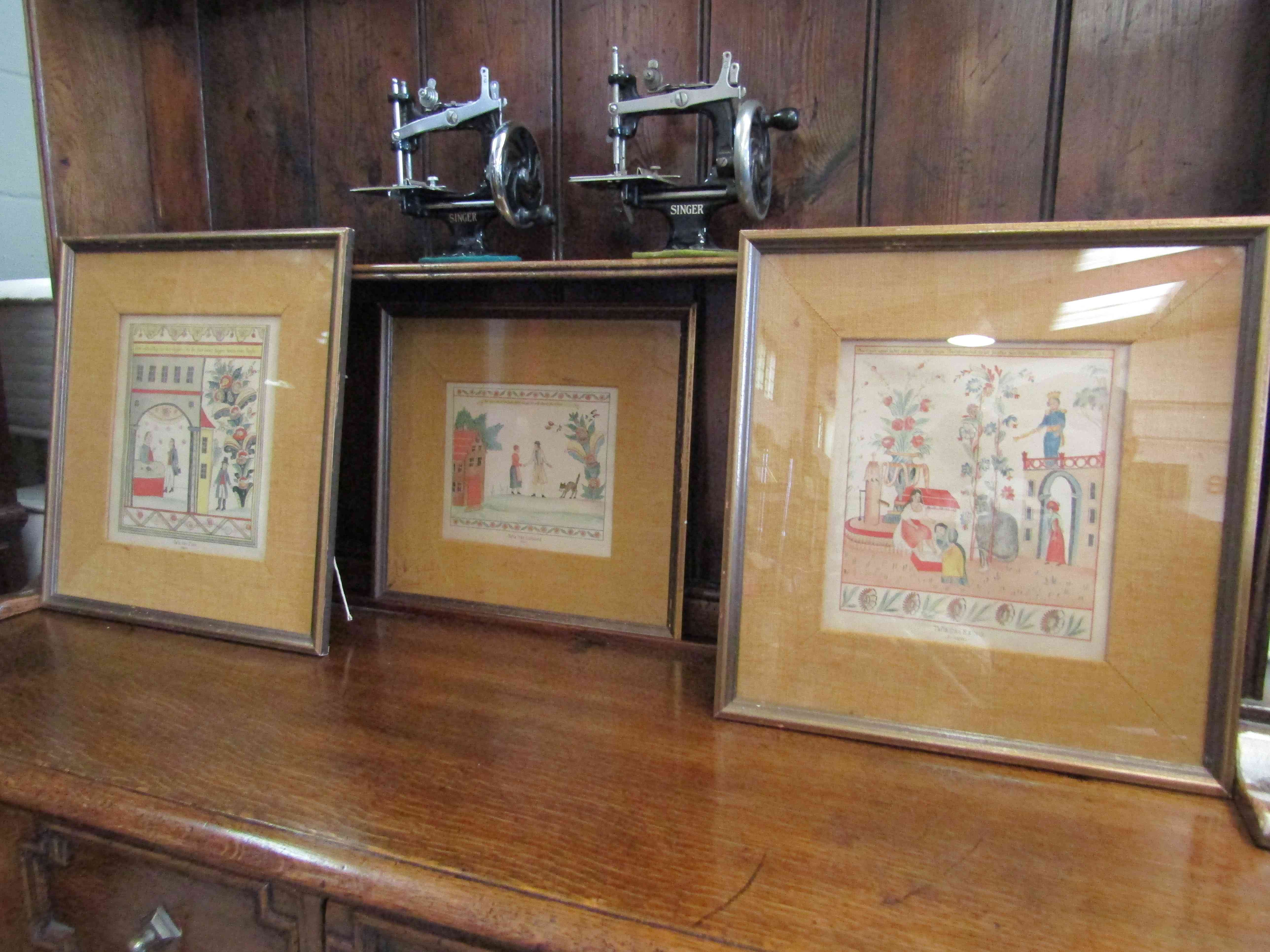 A set of three framed and glazed Swedish pictures