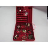 A jewellery box with contents