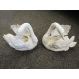 A matching pair of porcelain swans with registered mark,