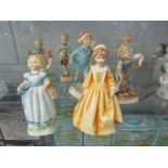 Nine Royal Worcester figurines, modelled by F.G.