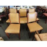 A set of four oak Art Deco style dining chairs, studded detail,