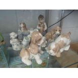 Seven Nao figures of puppies,