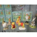 Eight boxed Royal Doulton Winnie The Pooh Collection figures