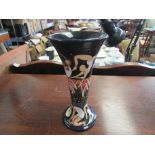 A Moorcroft The Athletes vase, designed by Kerry Goodwin,