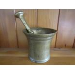 An 18th Century brass pestle and mortar