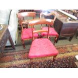 A pair of mahogany bar-back dining chairs and another