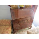 A 19th Century oak drop flap bureau with fitted interior and a two over two chest on bracket feet,