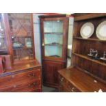 A 19th century mahogany corner cabinet with inlay and glazed door, cornice a/f,