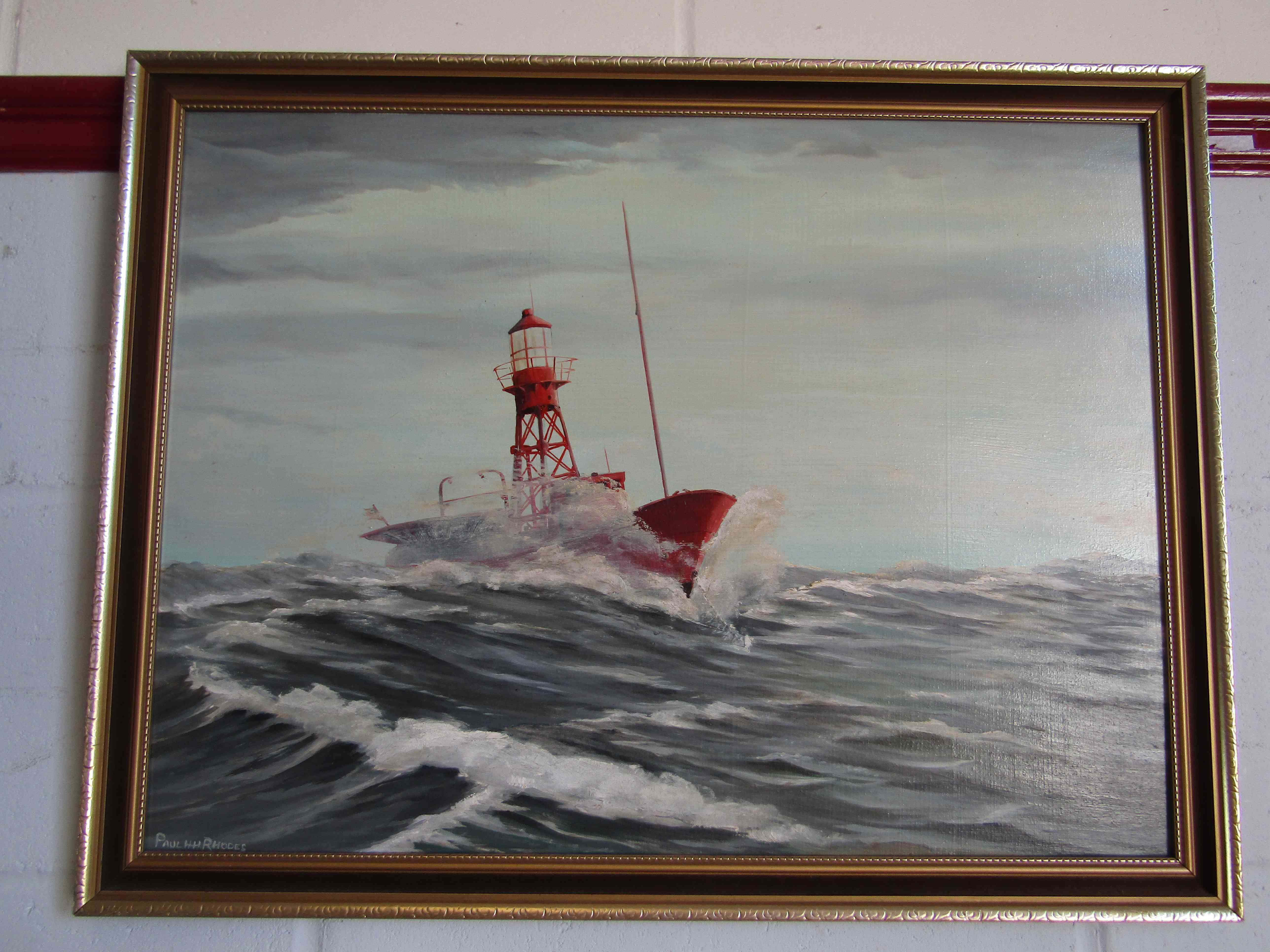 An oil on board of lighthouse boat signed Paul H.H.