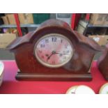 An Edwardian mantel clock in an inlaid mahogany case,