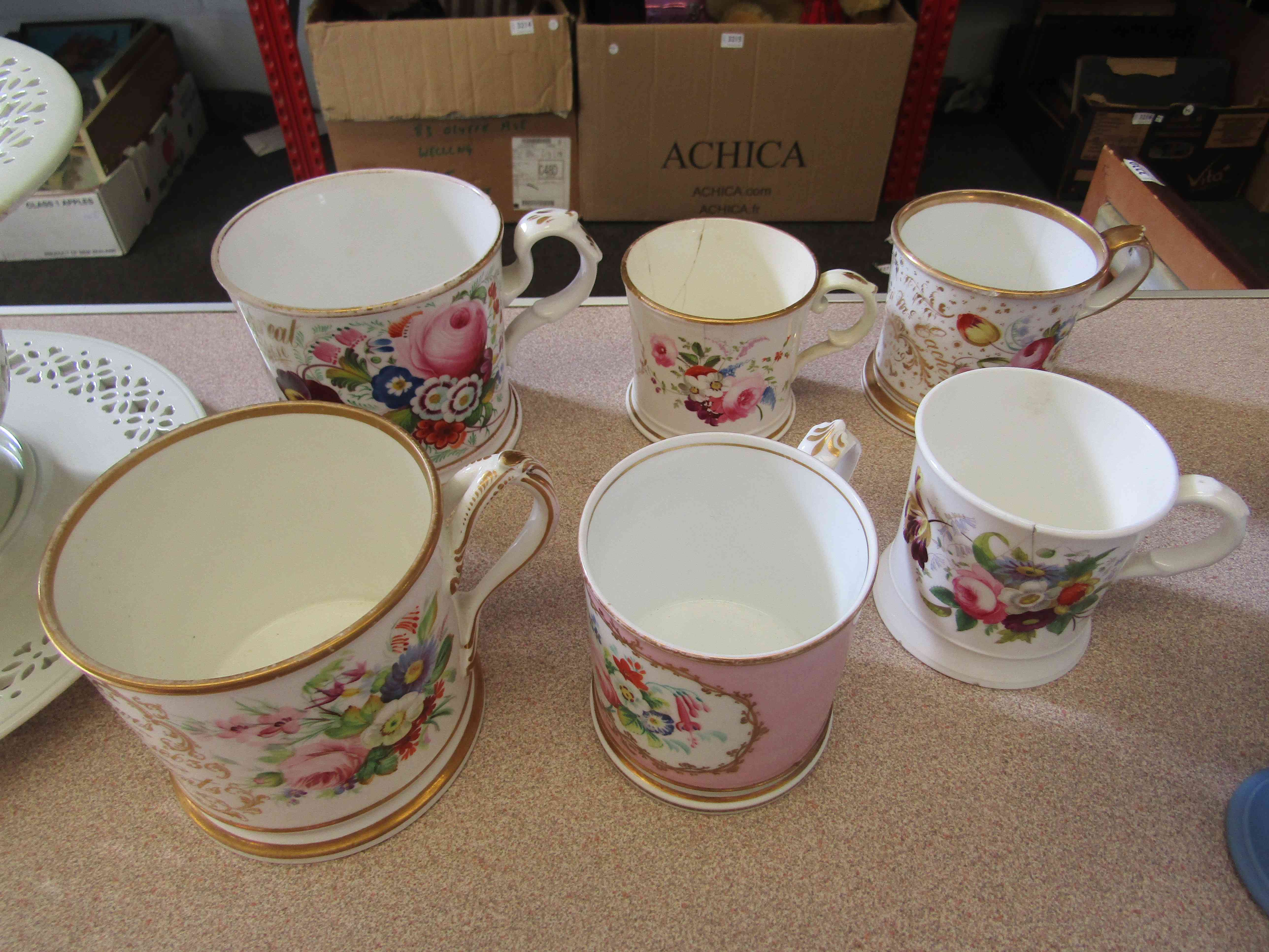 Six various Victorian inscribed and flower-painted mugs,