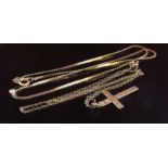 A 9ct gold flatlink necklace with single diamond, 40cm long and a gold cross pendant hung on chain,