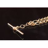 A gold neckchain hung with T-bar, stamped 375, 42cm long, 7.