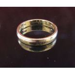 A 9ct gold wedding band, 4mm wide.