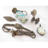 A Venetian glass scent bottle, enamelled locket, Victorian white metal bracelet, bow brooch,
