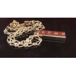 A 9ct gold ingot hung on neckchain stamped 9k, 50cm long,